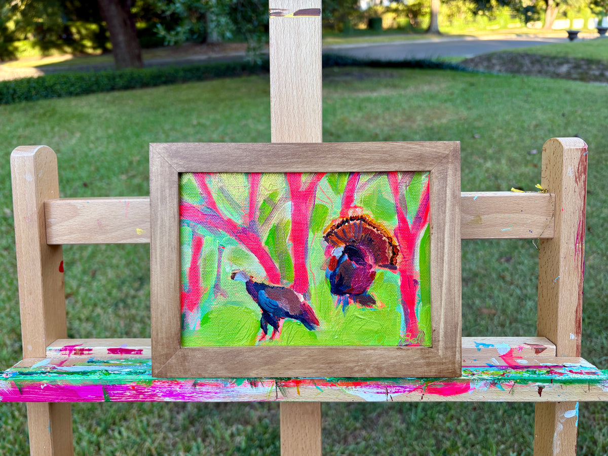He Brought a Date – painting on easel outdoors
